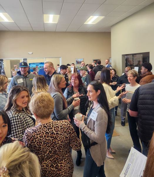 Members of the Puyallup Sumner Chamber fill the lobby of the Pierce Conservation District Office.