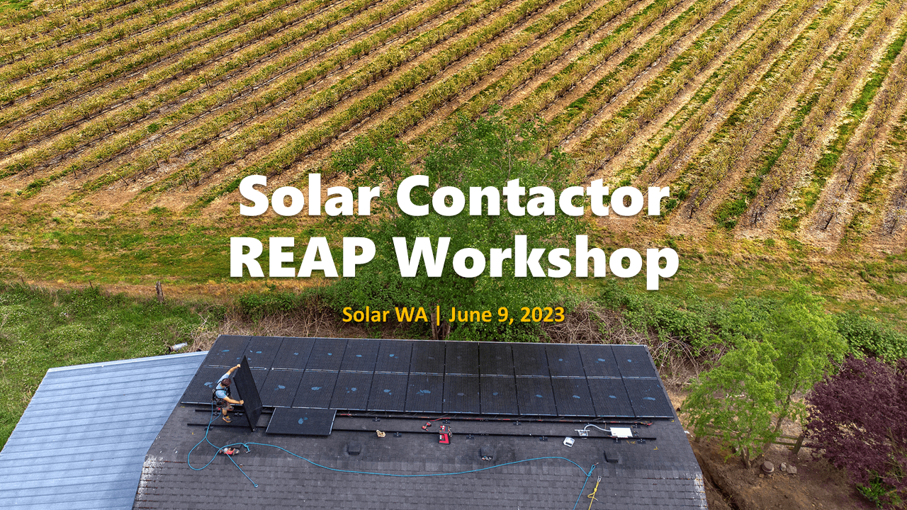 Image of a solar contractor installing solar on a farm building with blueberry crops in the backgrou Opens in new window