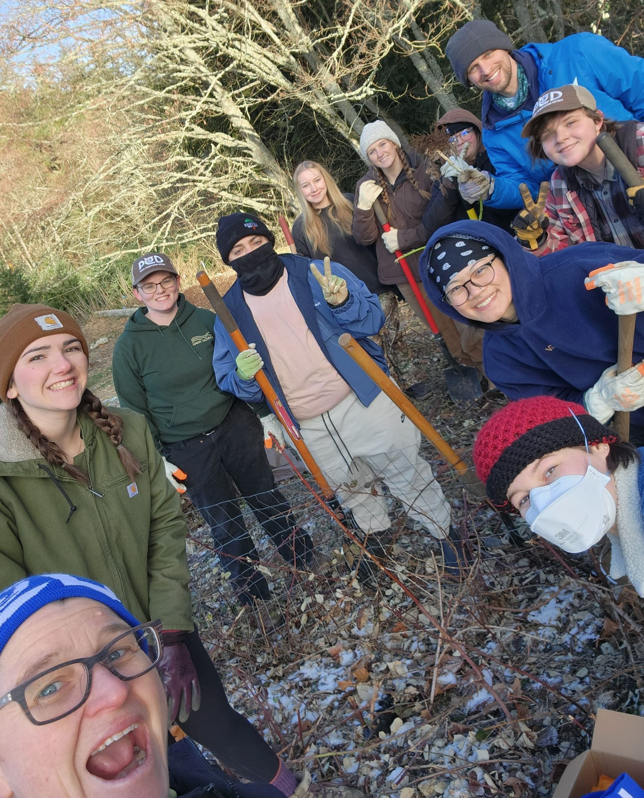A group of volunteers at Deadman's Pond take a selfie with Dana Coggon