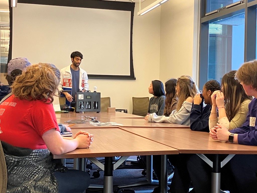 PHD Student Hareesh Iyer giving Envirothon students a demonstration on energy production